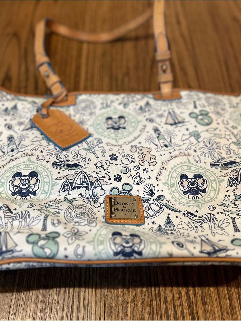 Dooney & Bourke White and Tan Disney Print Tote Bag